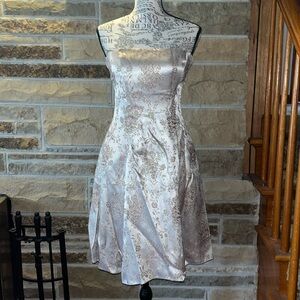 Zum Zum by Niki Livas size 1 blush/pink strapless dress. Around knee length.